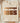 Cream Comfort Colors Juneteenth shirt featuring retro blocky 1865 lettering with tan to brown gradient and liberation symbolism
