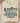 Boots And Bling It's A Cowgirl Thing DTF transfer on cream Comfort Colors blank with dimensional layered typography combining leopard and turquoise patterns, teal cursive script, western boot, hat, and horseshoe elements in cozy lifestyle flat-lay presentation