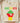 Cream Comfort Colors Juneteenth shirt featuring power fist graphic with Pan-African color blocks and keyhole design element
