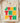 Cream Juneteenth t-shirt with bold 3x3 grid typography spelling JUNETEENTH in Pan-African green red yellow colors on Comfort Colors blank folded on wooden board