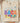 Colorful back-to-school transfer design on natural cream t-shirt with cheerful welcome message and school icons