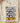 Sand cream Black Father Leader King empowerment shirt with gold crown and KING text folded on wood board