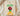 Sand cream Black Father Matter shirt with green red yellow empowerment graphic folded on wood board