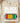 Cream Comfort Colors Black Power shirt with battery empowerment graphic in Pan-African colors folded on wooden board with soft blankets