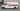 White cargo van with high-tack adhesive vinyl graphics applied to the side panel