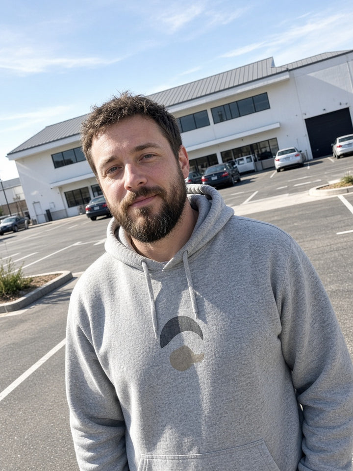 Customer wearing a printed hoodie outside