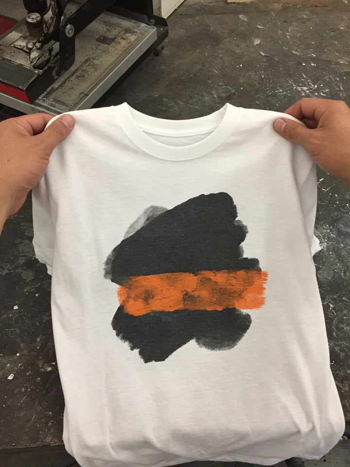 Freshly pressed tee on the work table