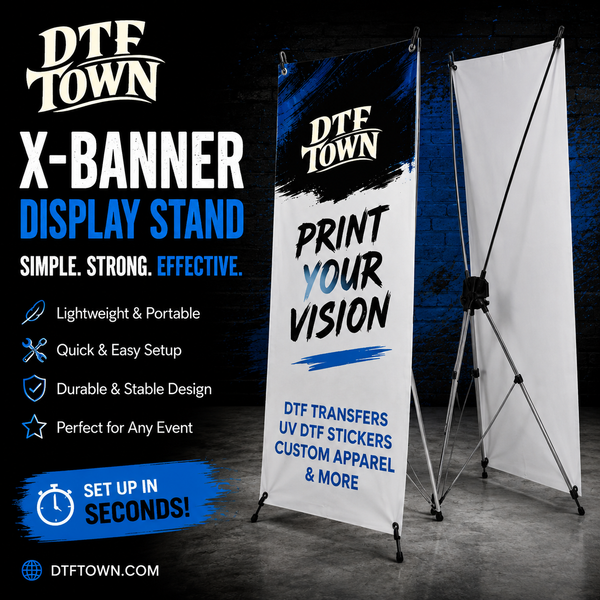 A promotional product image for a DTF Town X-Banner display stand, showing one fully set up banner with printed graphics and one empty white panel beside it. Text on the left highlights features like lightweight portability, quick setup, durable stable design, and suitability for any event.
