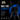 A close-up product shot of a black DTF Town banner stand with four fiberglass poles and central connectors, set against a dark background with blue graphic accents and marketing text reading 'BUILT FOR STABILITY.'.
